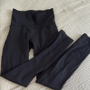 Lululemon black leggings with mesh size 2. Excellent condition!! NWOT